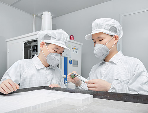 Workers in cleanroom