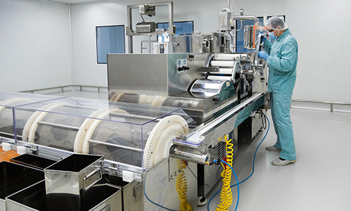 Man working in a plastic manufacturing factory